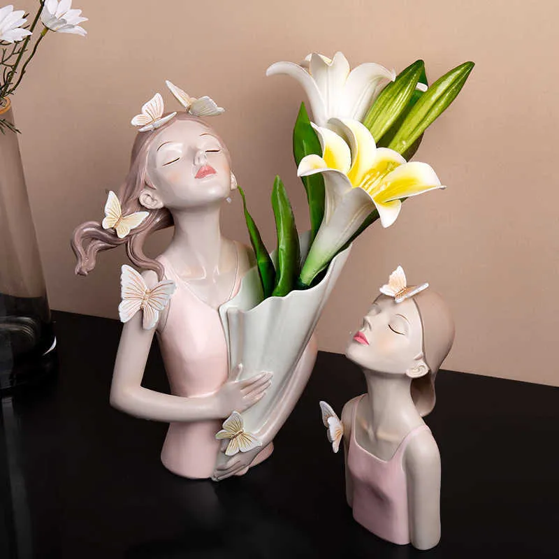 ノースルーインズバタフライガール樹脂彫刻キャラクターモデル花瓶モダンストレージ彫像ホームリビングルームデスクトップ装飾アクセサリー210811