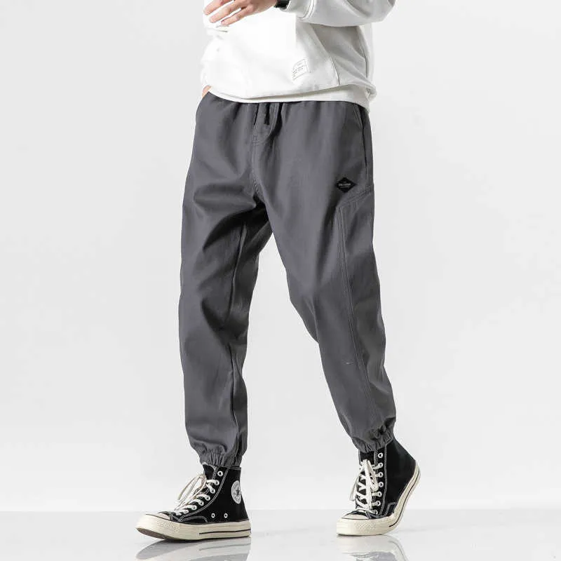Pantaloni casual da uomo di lunghezza della caviglia di primavera Pantaloni da uomo Streetwear Joggers Skin Sweatspants Plus Size 6XL 7XL 8XL 210715