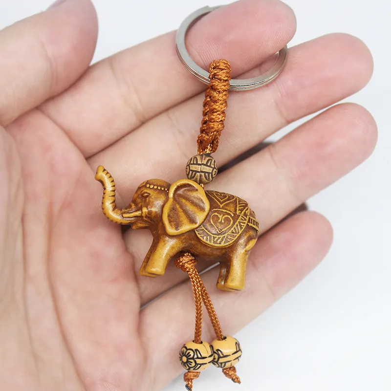Femmes hommes chanceux en bois éléphant sculpture pendentif Religion chaîne porte-clés porte-clés bijoux entier mignon porte-clés