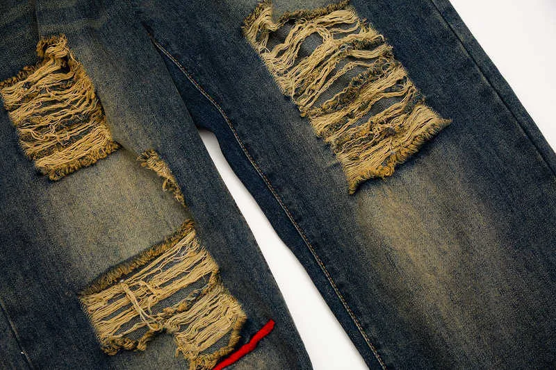 Jeans pour hommes L'industrie lourde du vent de la grande rue a utilisé des jeans décontractés droits à trous lavés