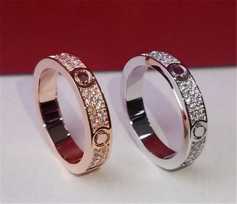 Lyxdesigner smycken kvinnor och mens modedesigner ringer klassisk diamant kärlek ring lyxys gyllene silver färg152d