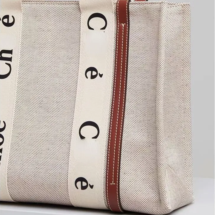 مصمم أكياس الكتف حرف طباعة شريط كبير سعة حمل القماش أنثى اليابانية حقائب اليد غير الرسمية 214L