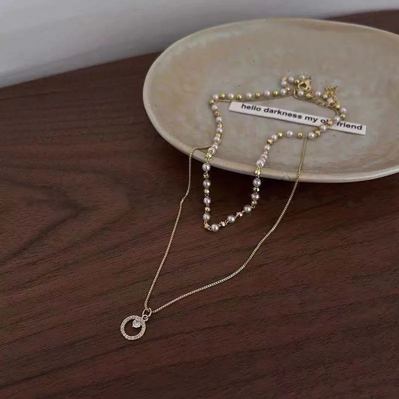 Collier d'accessoires de perle empilé à double couche