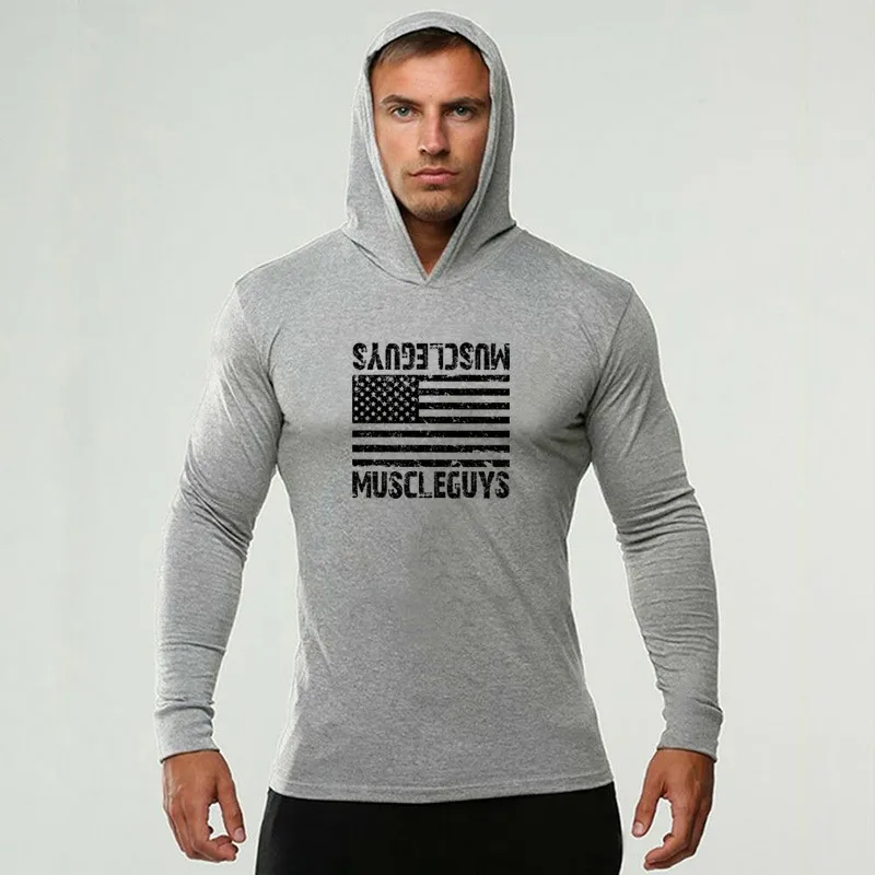 Muscleguys Bodybuilding T-shirt à manches longues Hommes Workout Coton Slim Fit T-shirt à capuche Homme Gym Workout Jogger Fitness Vêtements 210421