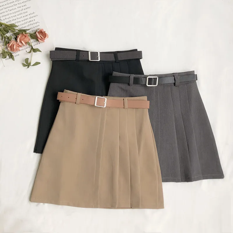 Llegada verano mujeres color sólido asimétrico mini faldas plisadas casual cintura alta una línea con cinturón 210430