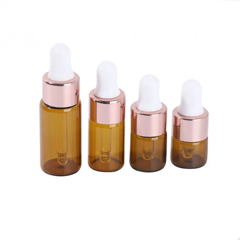 1ml 2ml 3ml Small Amber Glass Dropperflaskor Flaskor med Rose Gold Cap Essential Oil Perfume E Liquid Bottle Contianer