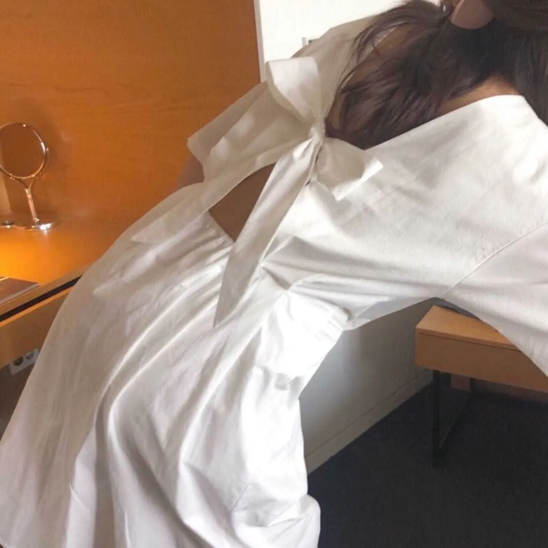 Big Sale Primavera / Verão Moda Coreana Branco Backless Laço Vestido Curva Vestido Elegante Sweet College Style 210615