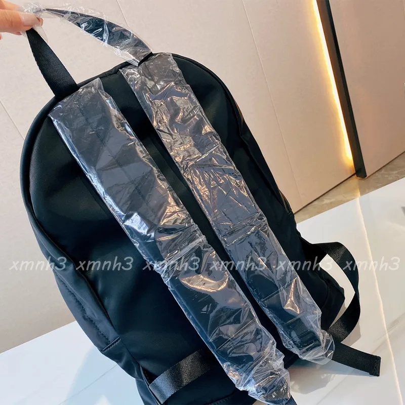 Mochilas para hombres de diseñador Fashion 2023 Mochila unisex Bolsas de viaje Material de tela impermeable259a