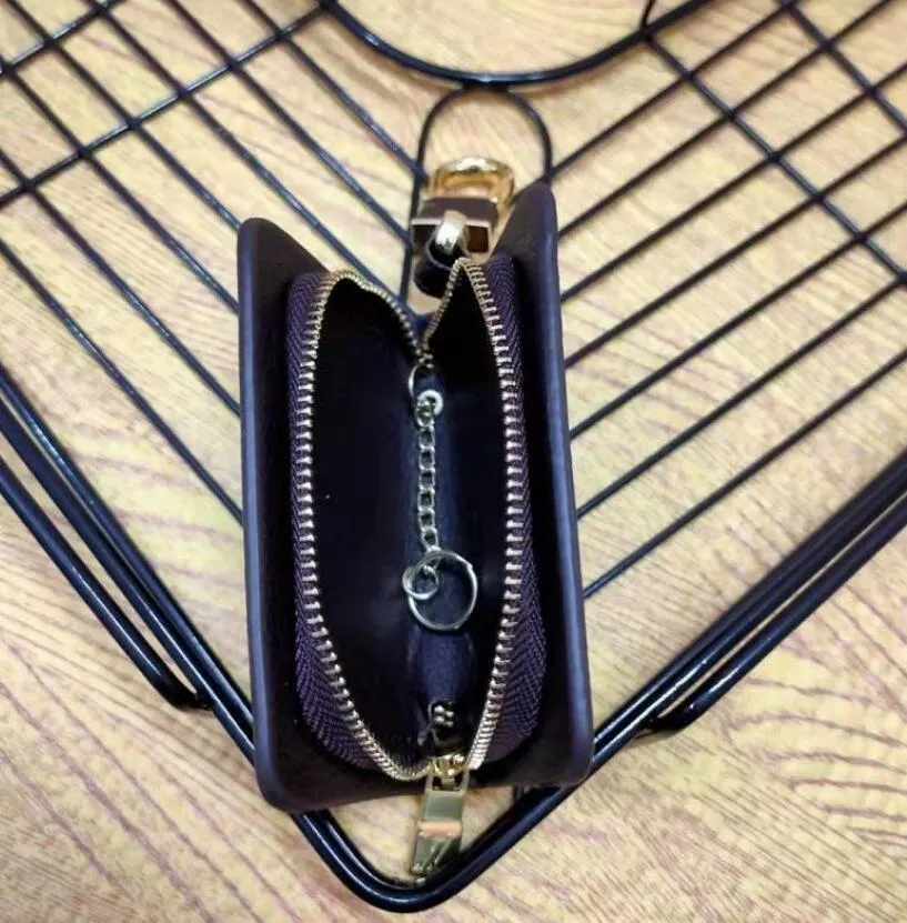 Klassieke brief afdrukken Key Wallets Luxe Designer Plaid Men Zipper Car Keychain Hanger Merk ZAKKE ZAKELIJKE VROUWEN VROUWEN COIN Portemonnees 240Y