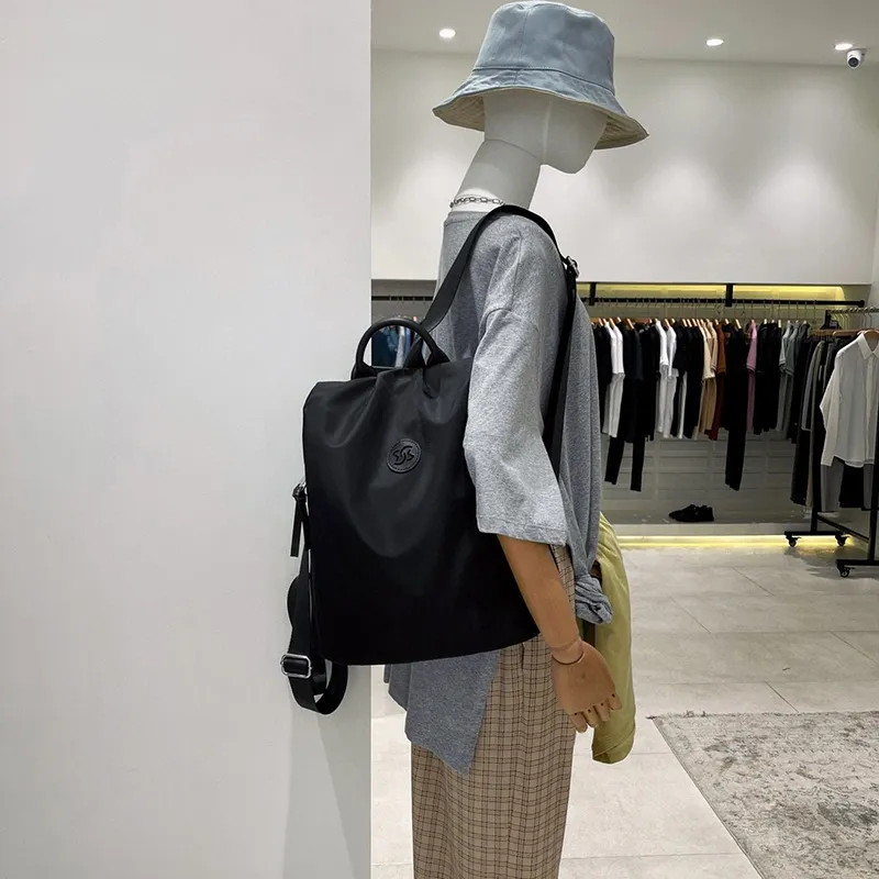 ファッションデザイン盗難防止ダブルバックパック女性シングルショルダーレジャー旅行バッグ学生学校バッグ