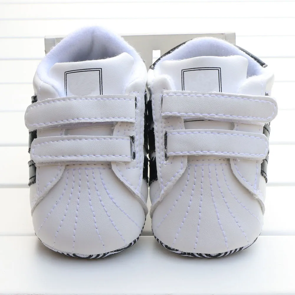 Recém -nascido Baby Primeiro Walkers Sapatos da primavera Autumn meninos meninas crianças infantil infantil esportes clássicos tênis macios Soled Antislip Shoes9581756