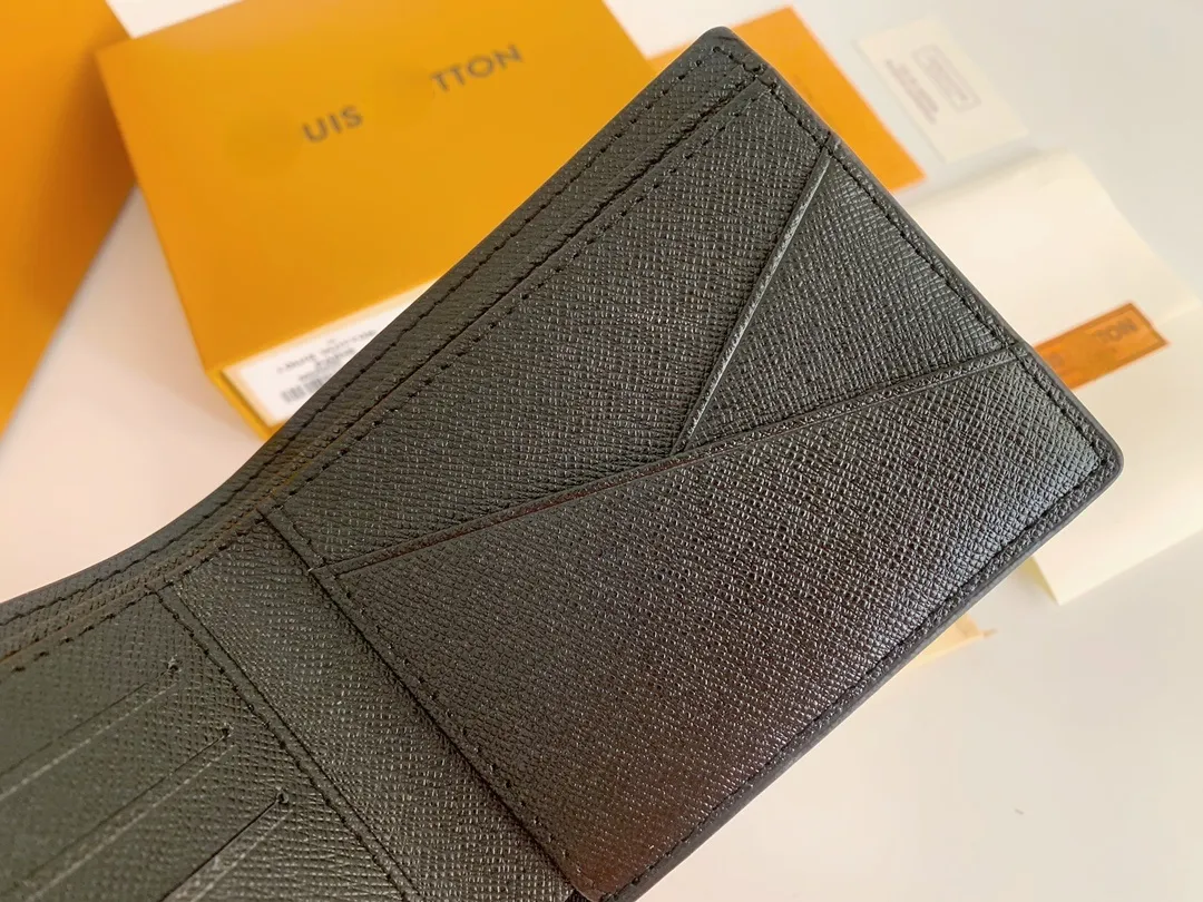 Myntpåse män kvinnor läder mynt handväska nyckel plånbok mini plånbok serienummer box dammväska