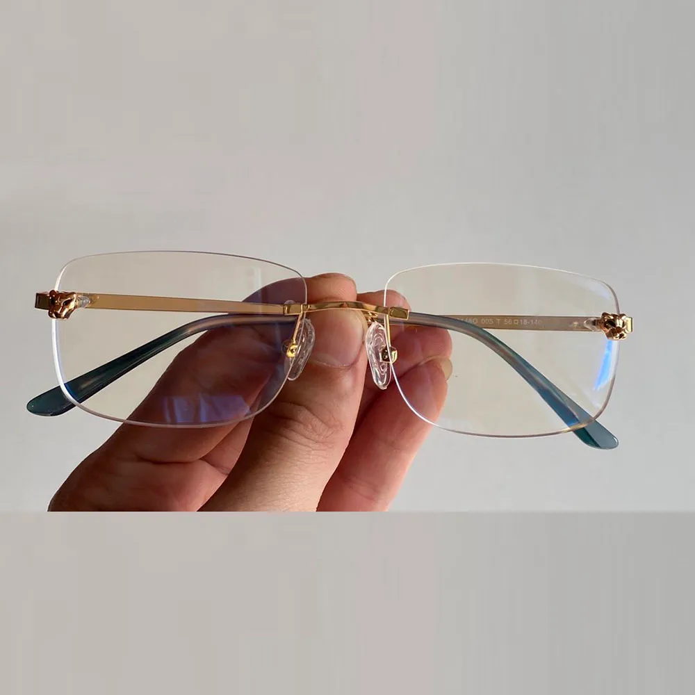 Uxury 디자이너 안경 광학 안경 표범 헤드 장식 프레임 림리스 안티 라운드 클래식 남자 액세서리 패션 S284C