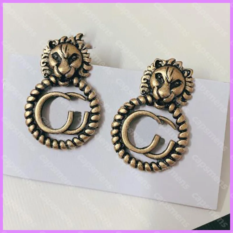 nuovi orecchini in oro retrò all'ingrosso donne street fashion orecchino rotondo gioielli di design di lusso signore orecchini a bottone animali lettere G mensD2110298F