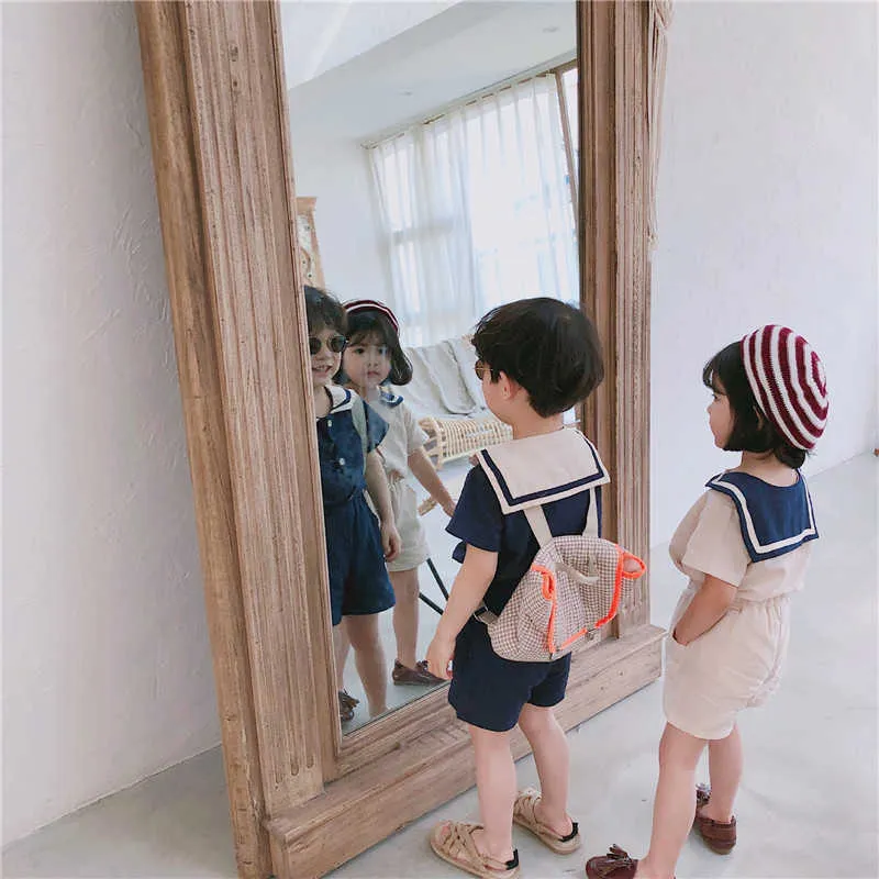 Sommar koreanska stil barn sjöman krage bomull linne kläder sätter söta pojkar flickor kortärmad t-shirt + shorts 2st satsar g003 210615