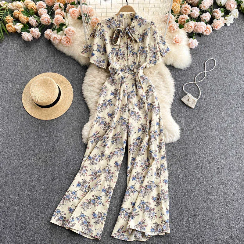 Femmes Summer Combinaison Bowtie Collier à manches courtes imprimé floral taille haute jambe large pantalon long style beash barboteuse vêtements féminins 210603