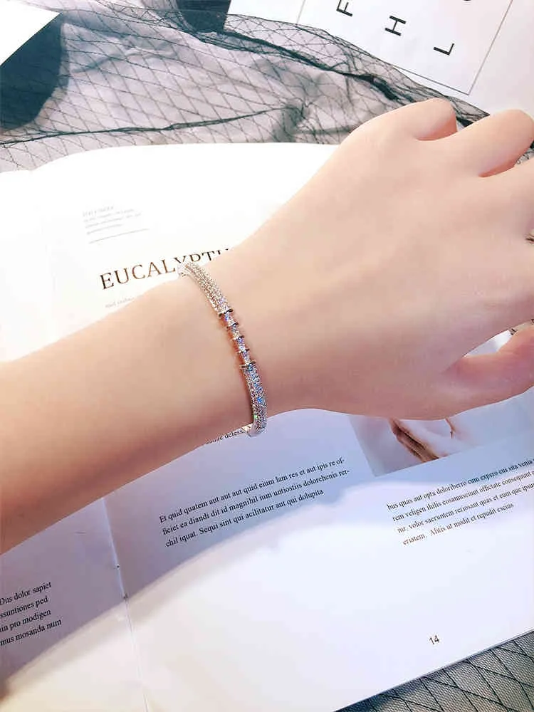 Marque de luxe Bling AAA Zircon boucle manchette bracelets pour femmes haut de gamme bijoux de mariage cadeaux meilleur Bracelet en cristal