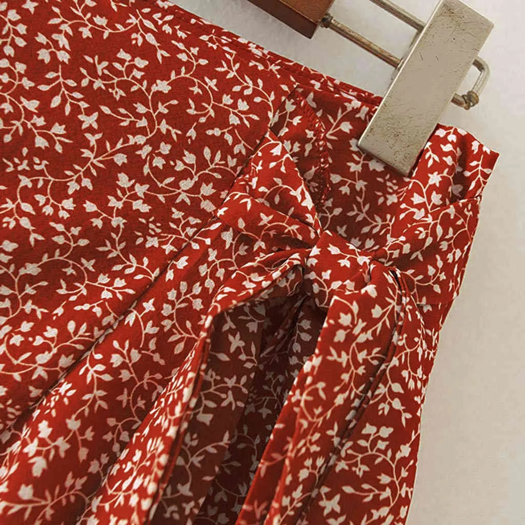 Falda vintage para mujer Falda con cordones de cintura alta para mujer Playa femenina Volantes Irregular Impreso Zip Mini Asimétrico 210508