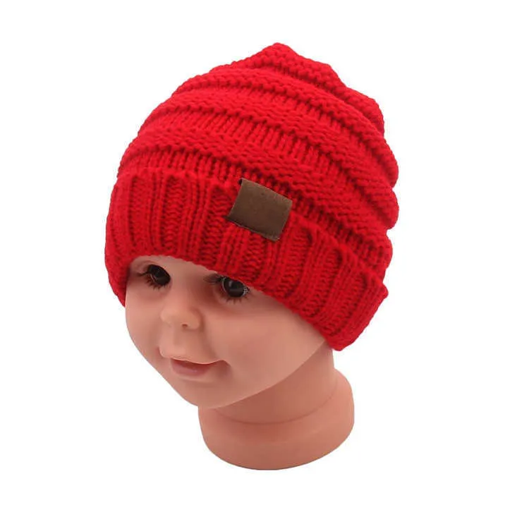 Crianças bebê crochê malha gorros chapéu unisex confetes designers grosso crânio boné esporte ao ar livre esqui headwear presente de natal cap4013695