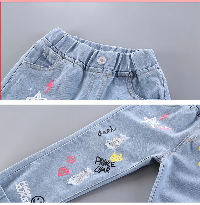Barnflicka jeans blommig tecknad långa byxor vårhöst graffiti målning tryck avslappnade byxor med hole jyf 220222331m6413045