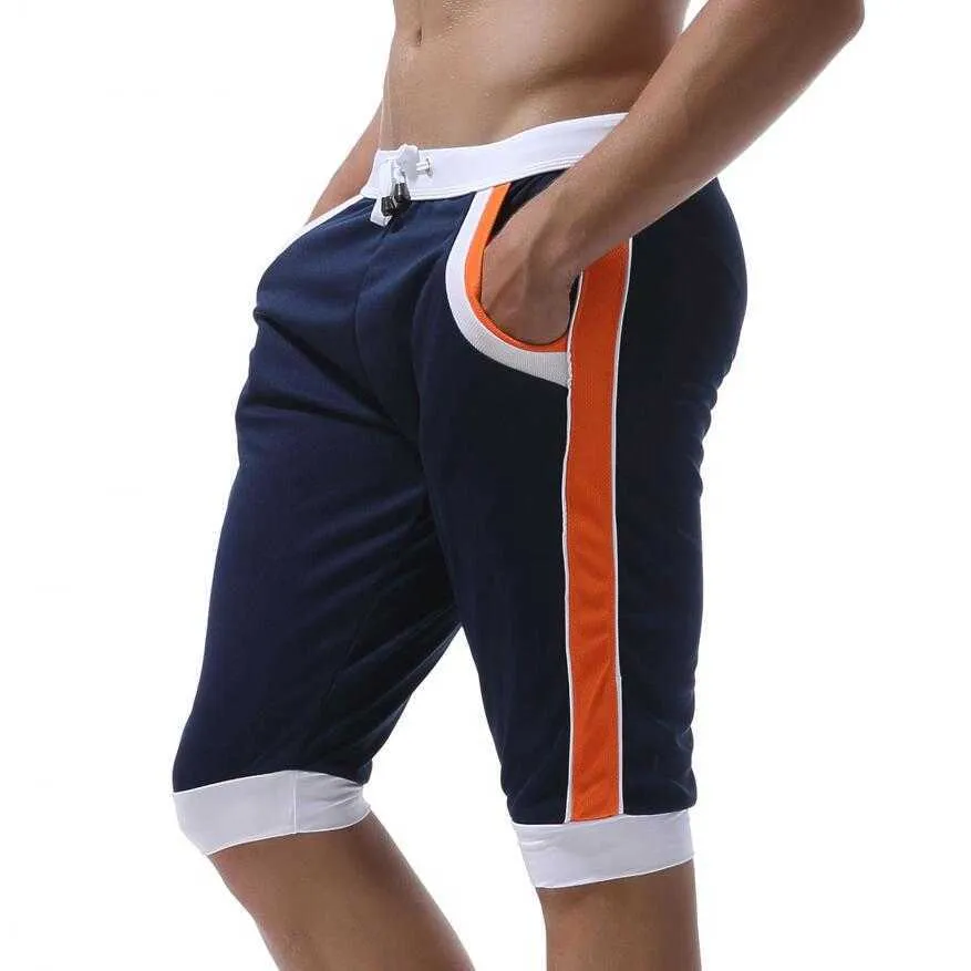 Sommar fritid Sportande shorts män byxor elastiska märke gym s mode snabb torr yttre slitage hemma 210714