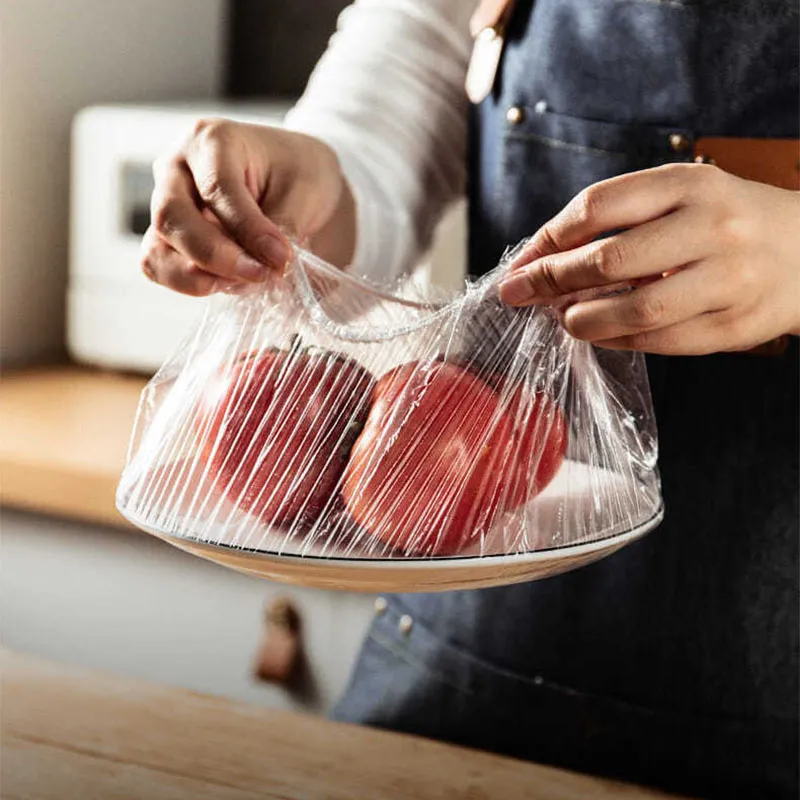 50/engångsmatlock Plastfolie Elastiska matlockar för fruktskålar Koppar Kepsar Storage Kök Färskt Att hålla Saver Bag