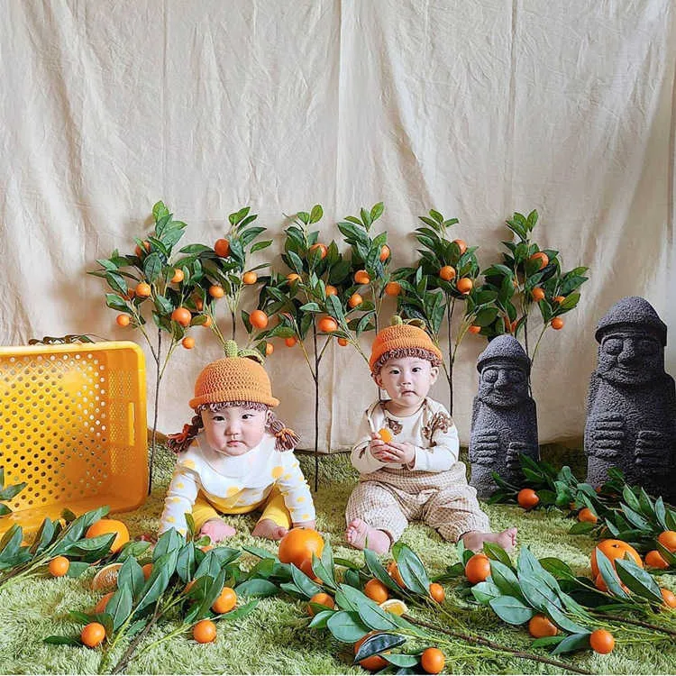 Barn baby äpple hatt hår pigtail fläta wig cap vinter varma stickade spädbarn barn hattar kepsar orange phyge rekvisita 210713