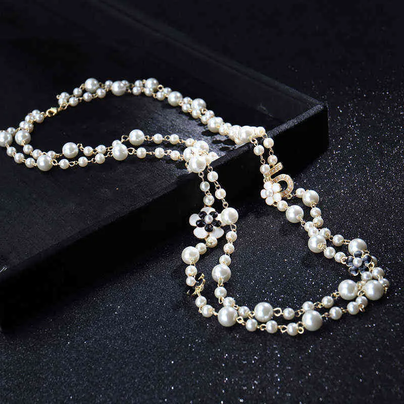 Kvinnor av hög kvalitet Långa hängen lager Pearl Necklace Collares de Moda nummer 5 Flower Party Jewelry281N3395126