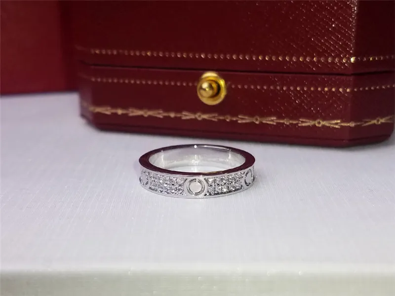 Lyxdesigner smycken kvinnor och mens modedesigner ringer klassisk diamant kärlek ring lyxys gyllene silver färg152d