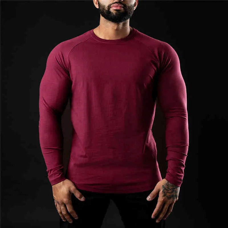 Fitness Solid Workout Tee Top Gym Uomo Cotone traspirante Sport T-shirt manica lunga Primavera Fashion Brand O-Collo Slim Fit Tshirt 210421