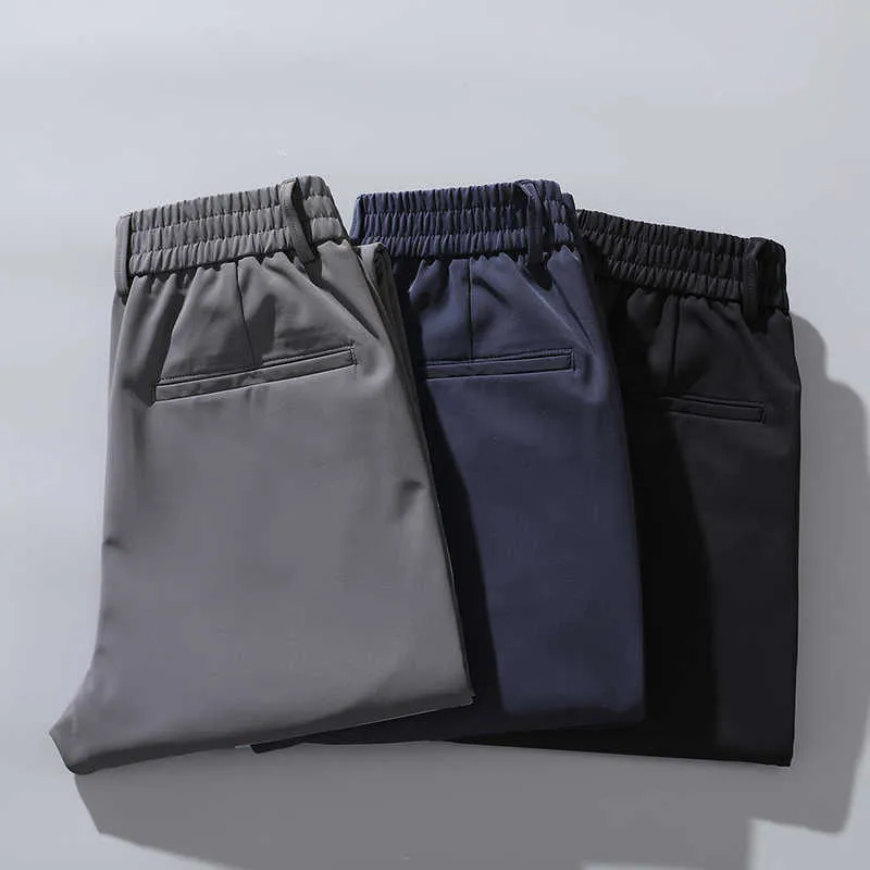 Осенние брюки мужские стретрельные корейские повседневные Slim Fit Eaulastic талия Jogger бизнес классические брюки мужские черный серый синий 28-38 211013
