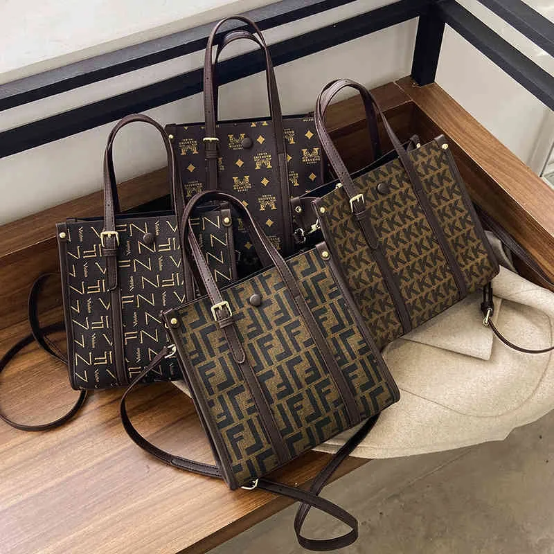 Handbag printed winter high-capacity single classic trend hand busins women's msenger factory wholale 70% off