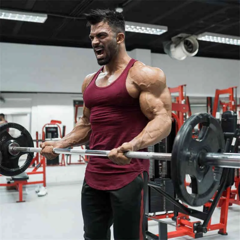 Muscleguys Solid Gym Abbigliamento Fitness Mens Stringer Tank Top Bodybuilding Camicia senza maniche Muscle Vest Workout Singlets Tanktop 210421