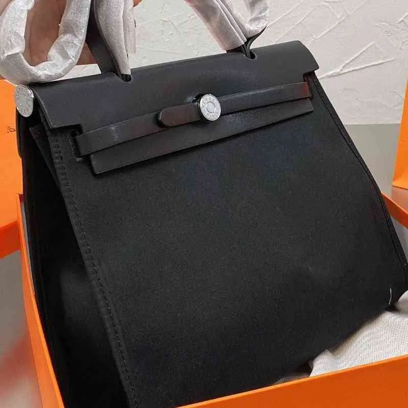 디자이너 핸드백 KE11YSS 2022 패션 기질 가방 캔버스 대용량 고용량 싱글 어깨 메신저 여성