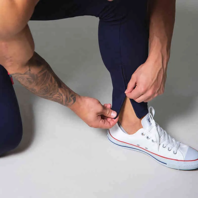 Witte jogger jogger heren Casual Skinny Cotton Pants Gym Fitness workout broek Mannelijke Spring Sportswear Trackbroekbodems G220713