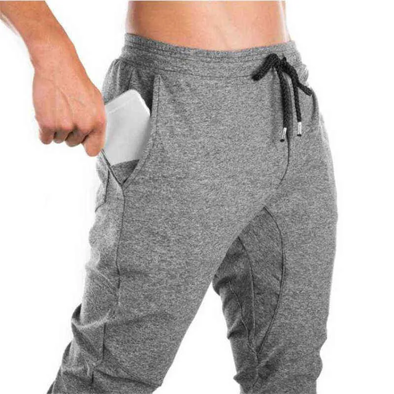 Nouveau 2020 automne hommes gymnases pantalons mode hommes pantalons de survêtement Fitness Slim Fit hommes joggeurs musculation pantalons de survêtement taille 3XL G220713