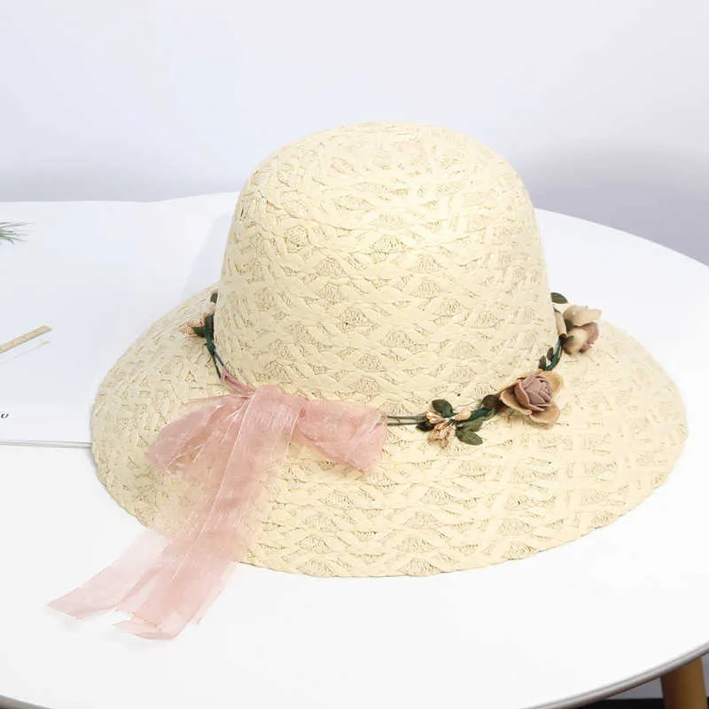 2022 뜨거운 여름 새로운 여성의 일선 모자 버킷 모자 베이지 색 레이스 bowknot 꽃 리본 플랫 탑 밀 짚 모자 비치 모자 파나마