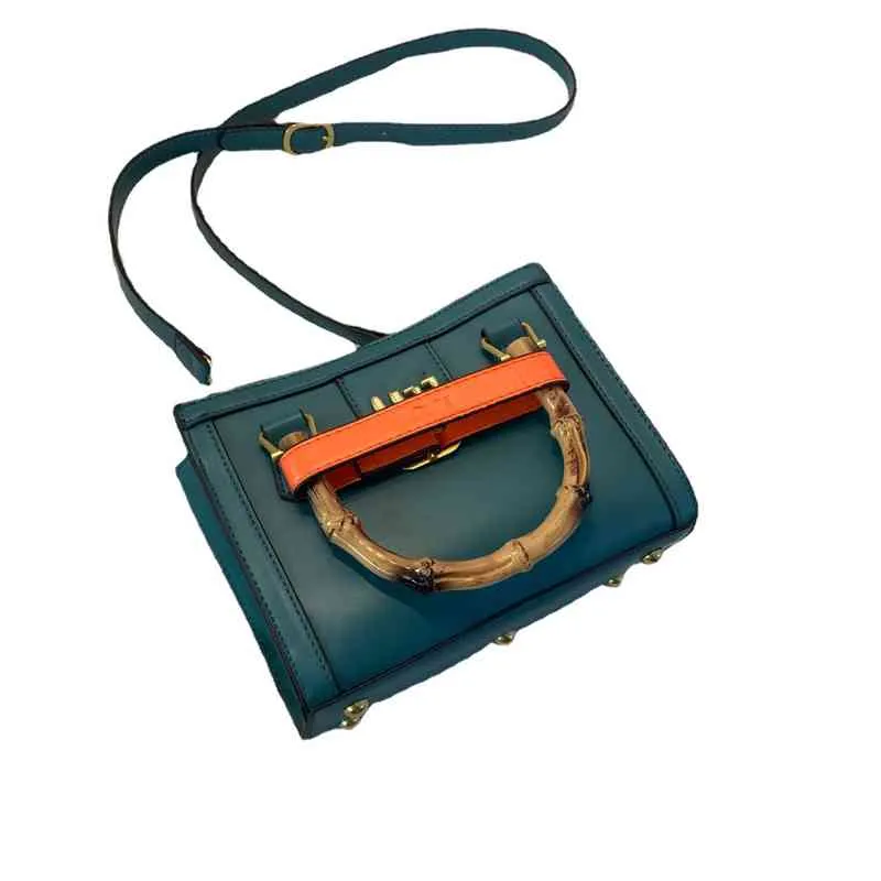 Solid Färg Enkel Högkapacitetsversion av Kvinnor Temperament Pendling Shopping Texture Small Square Bag
