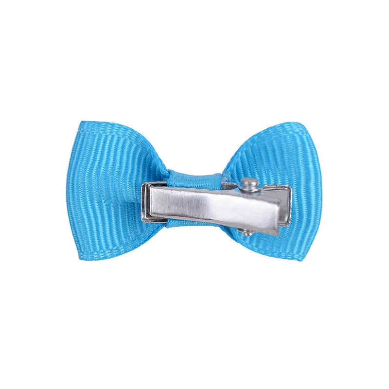 20 pçs / lote 1.3inch Bowknot sólido com grampo de metal Doce presente de cabelo para menina crianças bonitos pequenos cabeleireiros crianças acessórios de cabelo AA220323