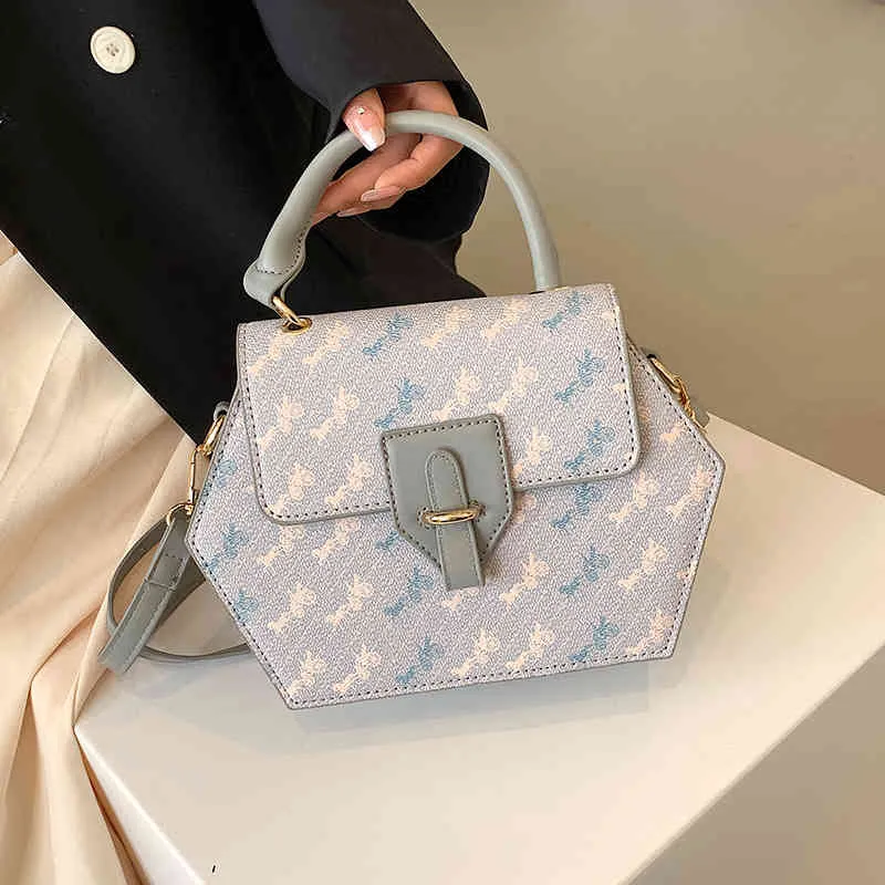Bayan moda lüks marka gelgit çantası toptan el çantası 2022 Yeni Kadın Messenger Çok yönlü zincir büyük kapasiteli dokulu kutu