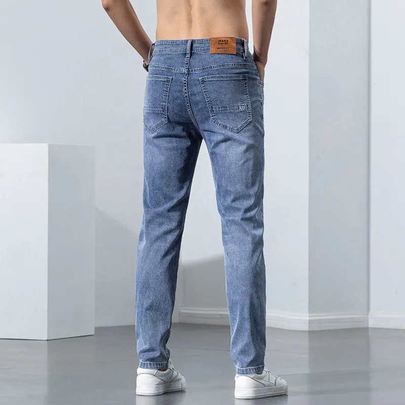 Jeans skinny elasticizzati da uomo Pantaloni slim fit in denim di cotone casual moda primaverile Pantaloni da uomo 220726