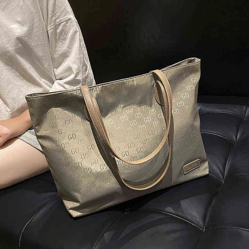 Fabrik online exportdesigner väskor stora kvinnors tote ny modduk handväska mångsidig stor kapacitet axel axel