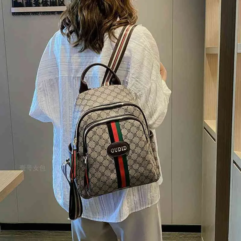 Backpack women's bag 2022 new versatile large capacity schoolbag leisure simple travel backpack Purse