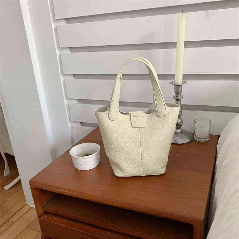 Bolsa de bolsa de couro bens de couro versão lichchee padrão de couro macio bolsa feminina saco de lazer simples de lazer