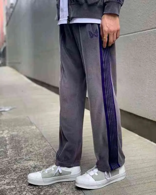 Awge igły spodnie mężczyźni kobiety Hip Hop wysokiej jakości motyl haftowane igły, aby śledzić spodnie do joggingu japonia spodnie kryty Tag T220721