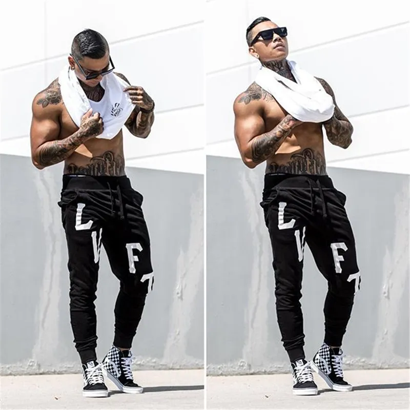 Män kroppsbyggande tank tops gymträning fitness bomull ärmlös skjorta som kör kläder stränger singlet manlig sommar avslappnad väst 220527