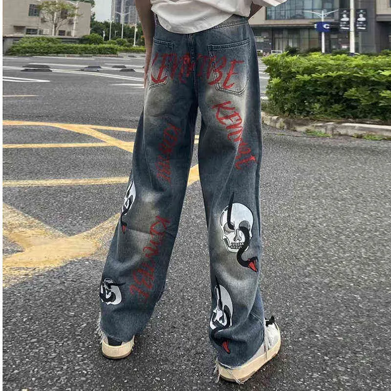 Harajuku Serpent Crâne Lettre Pleine Impression Effilochée Streetwear Rétro Denim Pantalon Hommes et Femmes Droites Déchirées Jeans Pantalons T220803