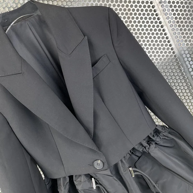 Twotwinstyle minimalistisk solid fold pläterad kvinnlig blazer notched långärmad löst midja patchwork kvinnors kappa höst 220402