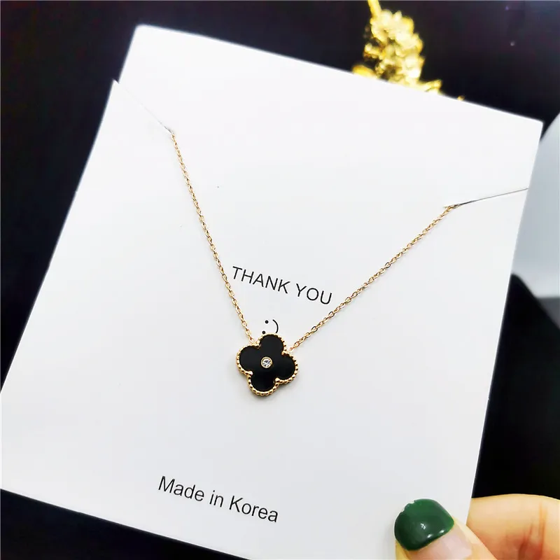 Colliers de suspension de trèfle vert en or rose coréen 18K avec collier en acier inoxydable à chaîne transversale pour femmes42415030828