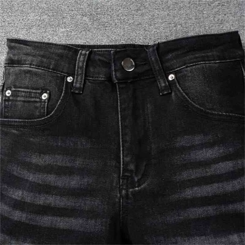 Designer de jeans pour hommes Amirrss Jeans Fog New Black Knee MX2 Zipper Splicing Locomotive Hole Denim Pantalons High Street Tendance SLP KXEJ